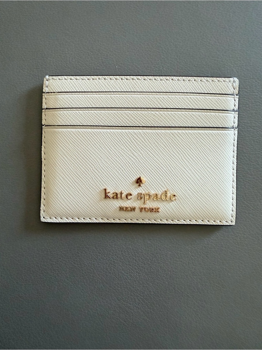 kate spade Cream Saffiano Slim Card Case with Gold Logo